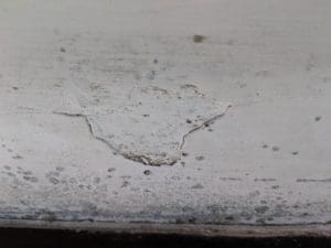 Rising damp diagnosis and damp proof course detection.