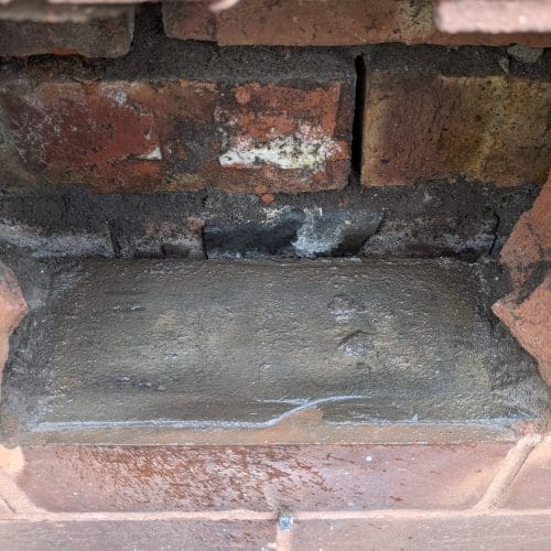 80 year old damp proof course exposed during a rising damp dispute survey.