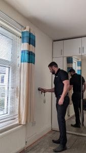 Damp and timber surveyor carrying out a full damp and timber survey.